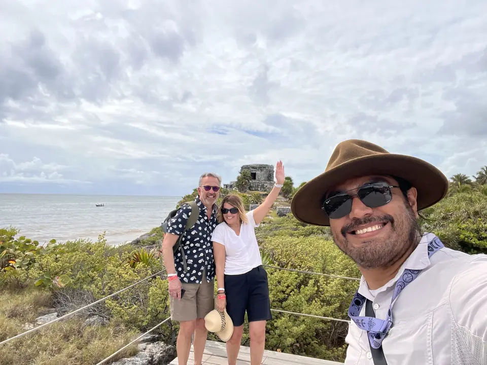 Local guide with travelers at Tulum