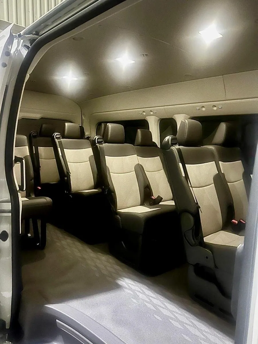 Actual clean passenger seating inside a Tours Aldea Toyota Hiace